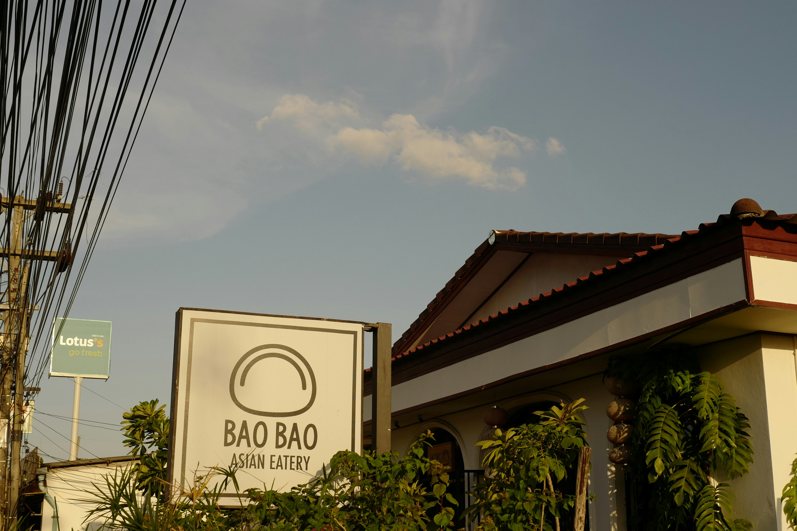 a building with a sign that says bao bao above it