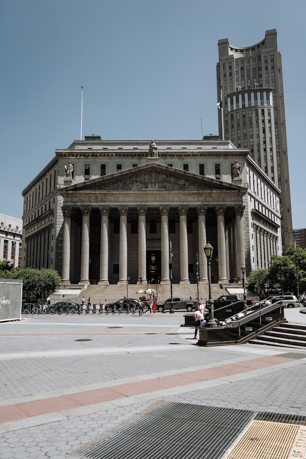 a large building with columns and pillars in front of it