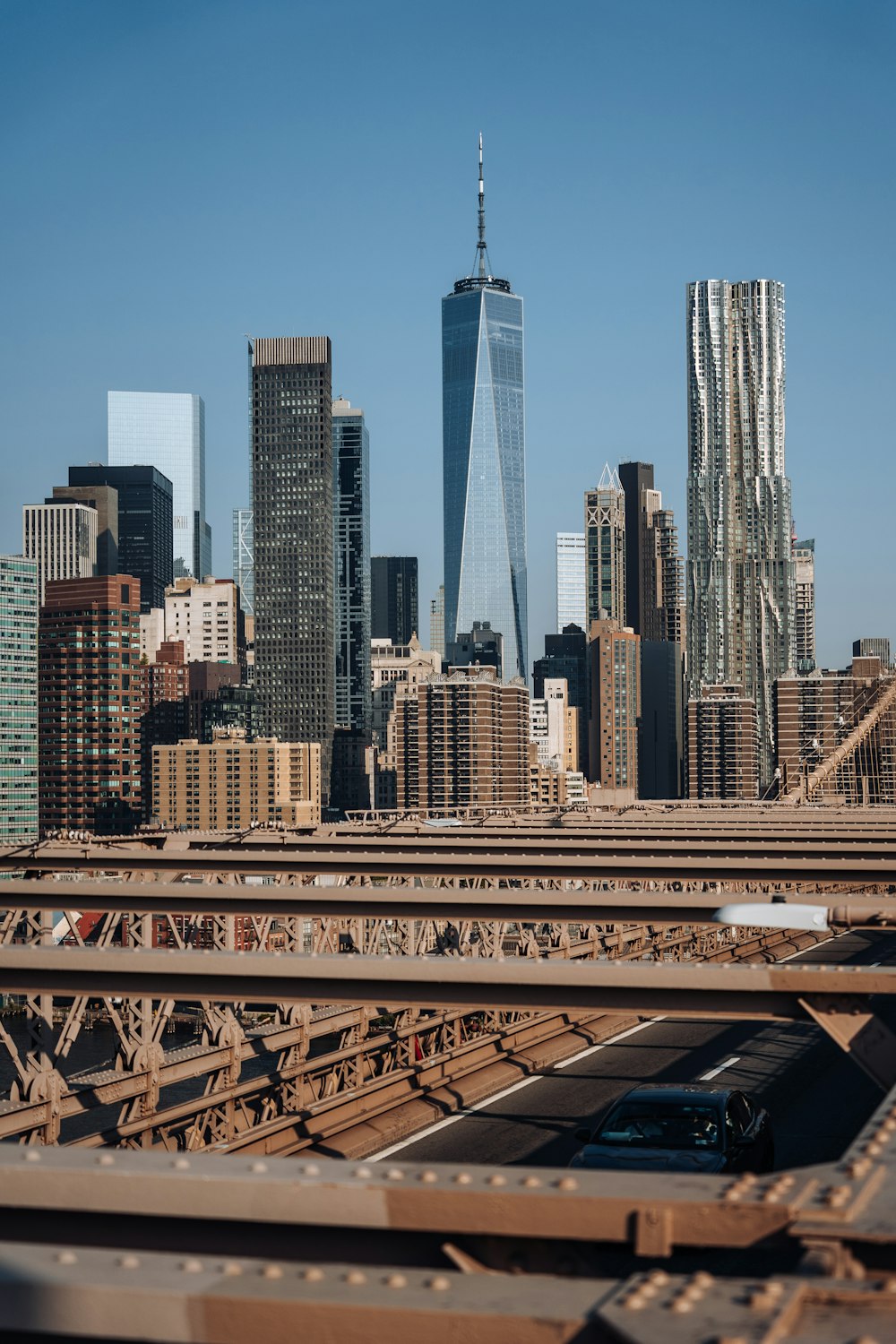 a view of a city skyline from a bridge