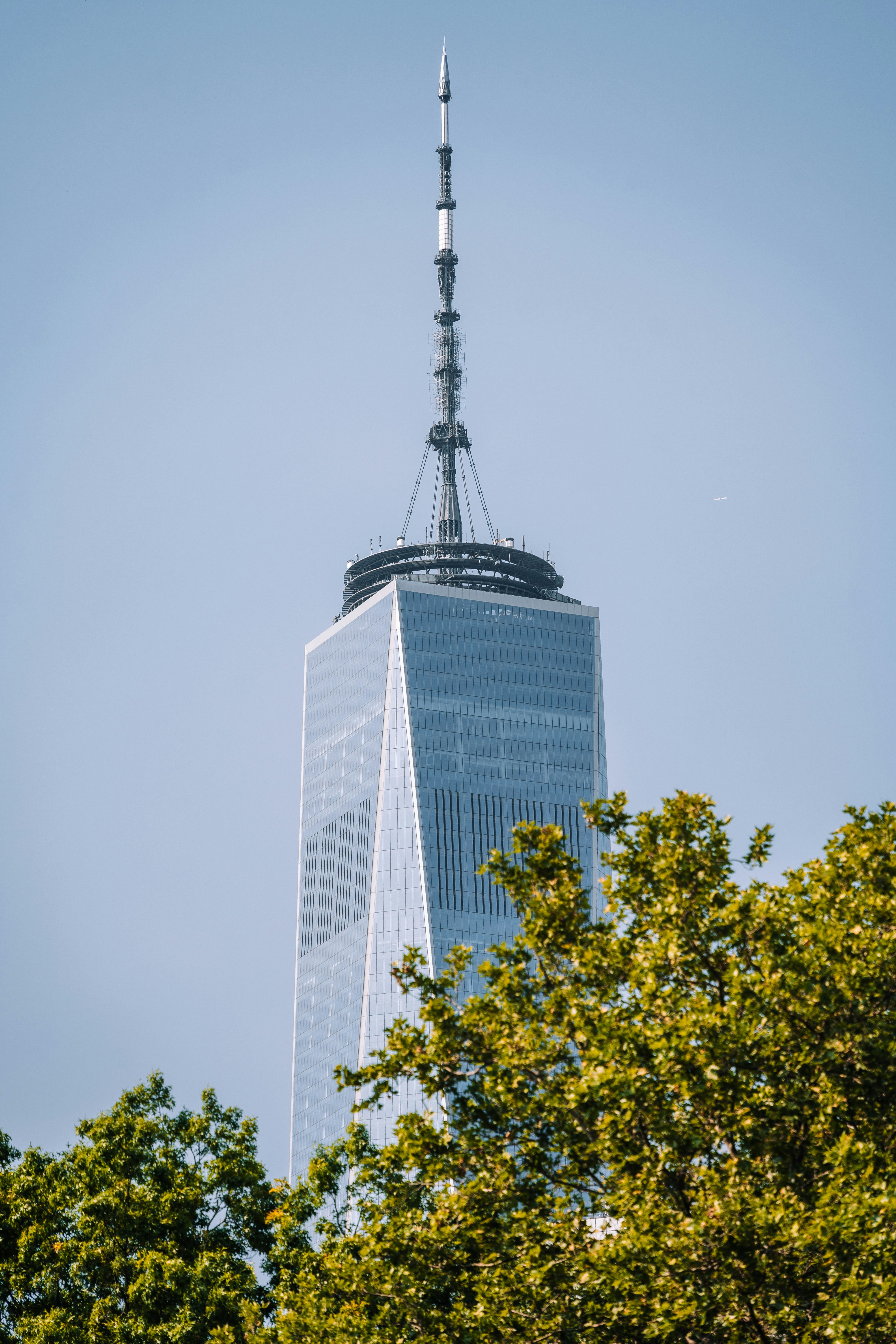 A very tall building with a very tall spire photo Free New york Image