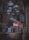 A collection of vintage items including an antique gramophone with a large horn speaker, an old-fashioned radio, and various other retro objects. The setting appears to be a dimly lit room filled with vintage decor such as hanging lamps and an old statue.
