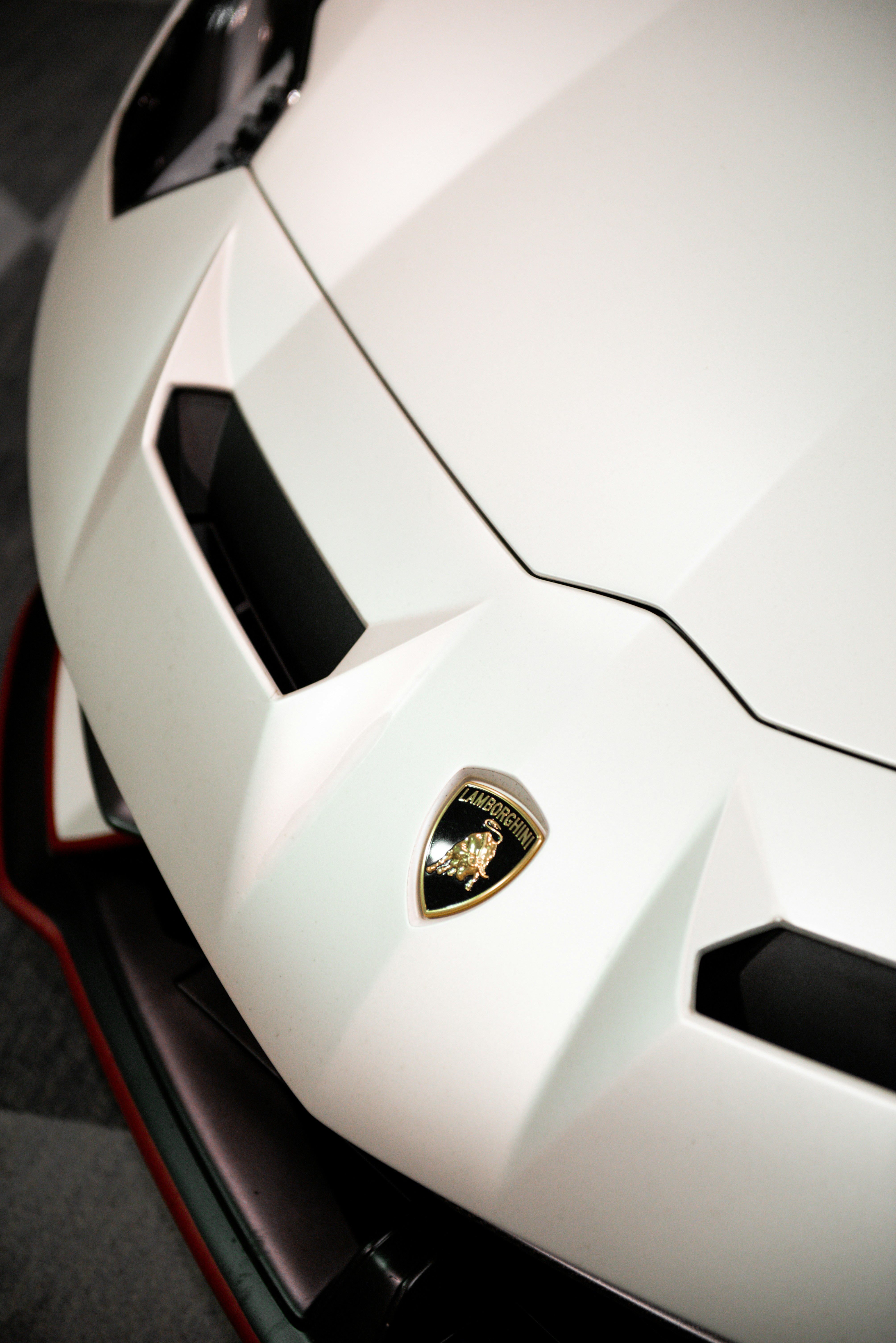 a close up of the front of a sports car