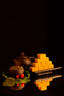 Close-up of tightly pressed small square tea cakes stacked neatly.