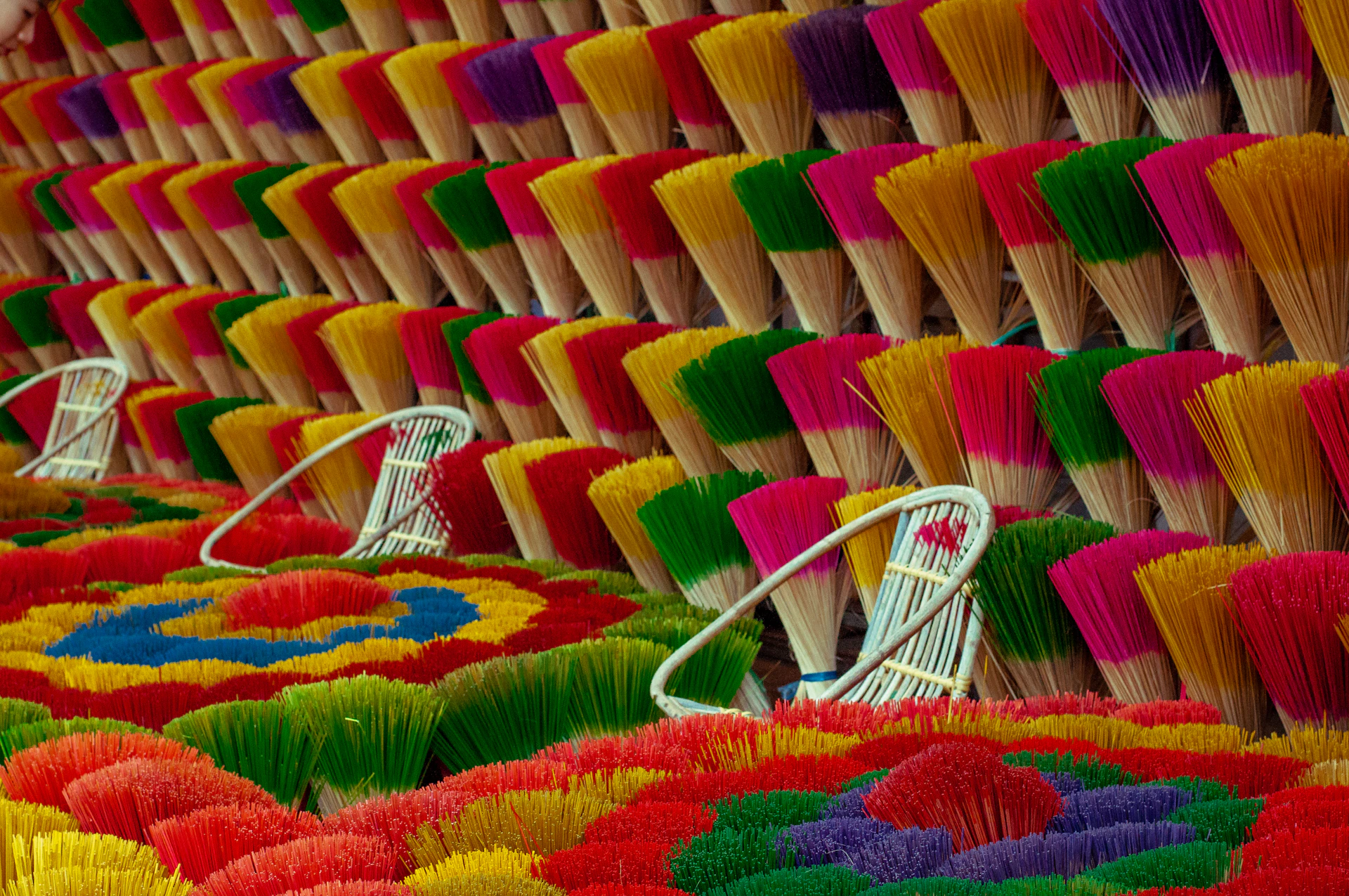 woman wearing yellow long-sleeved dress under white clouds and blue sky during daytime