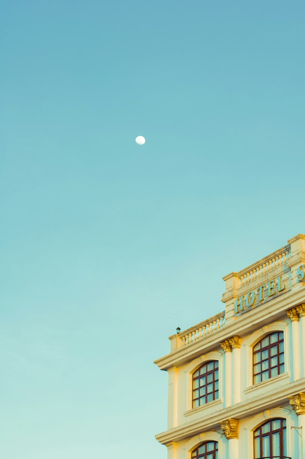 a building with a clock on the top of it