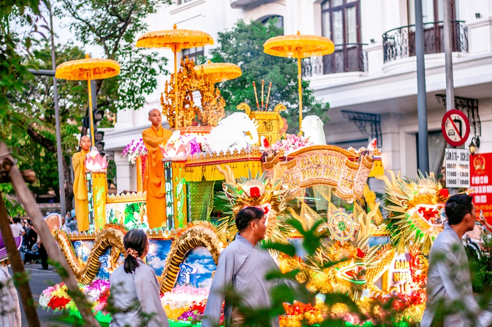 a group of people riding a float down a street