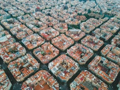 A colorful GIS map displayed on a computer screen showing urban zones.