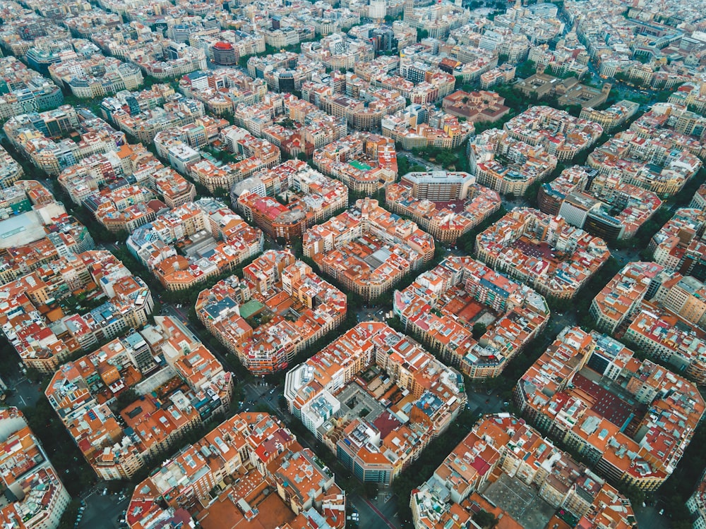 an aerial view of a city with lots of buildings