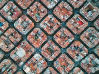 Aerial view of an urban area with geometric shapes highlighting measured zones.