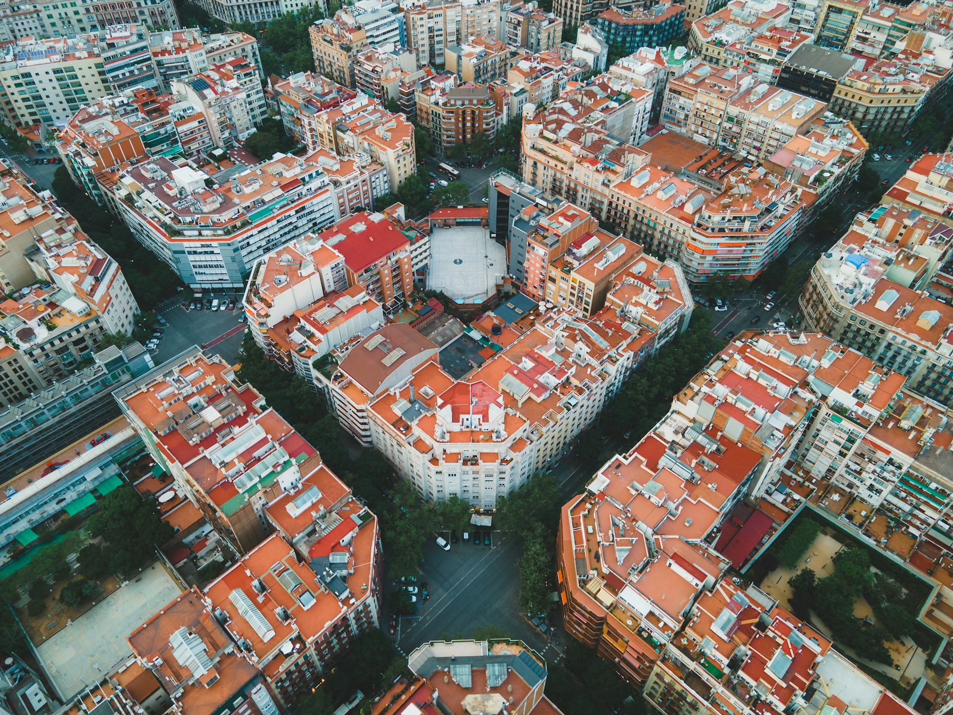 an aerial view of a city with tall buildings