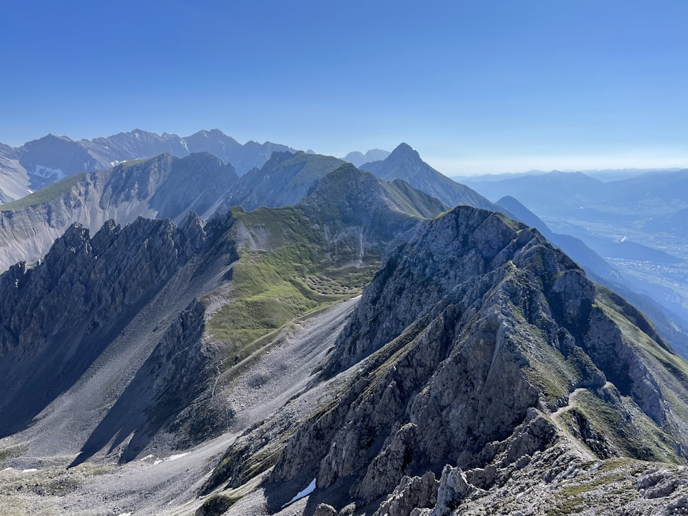 a view of the mountains from the top of a mountain