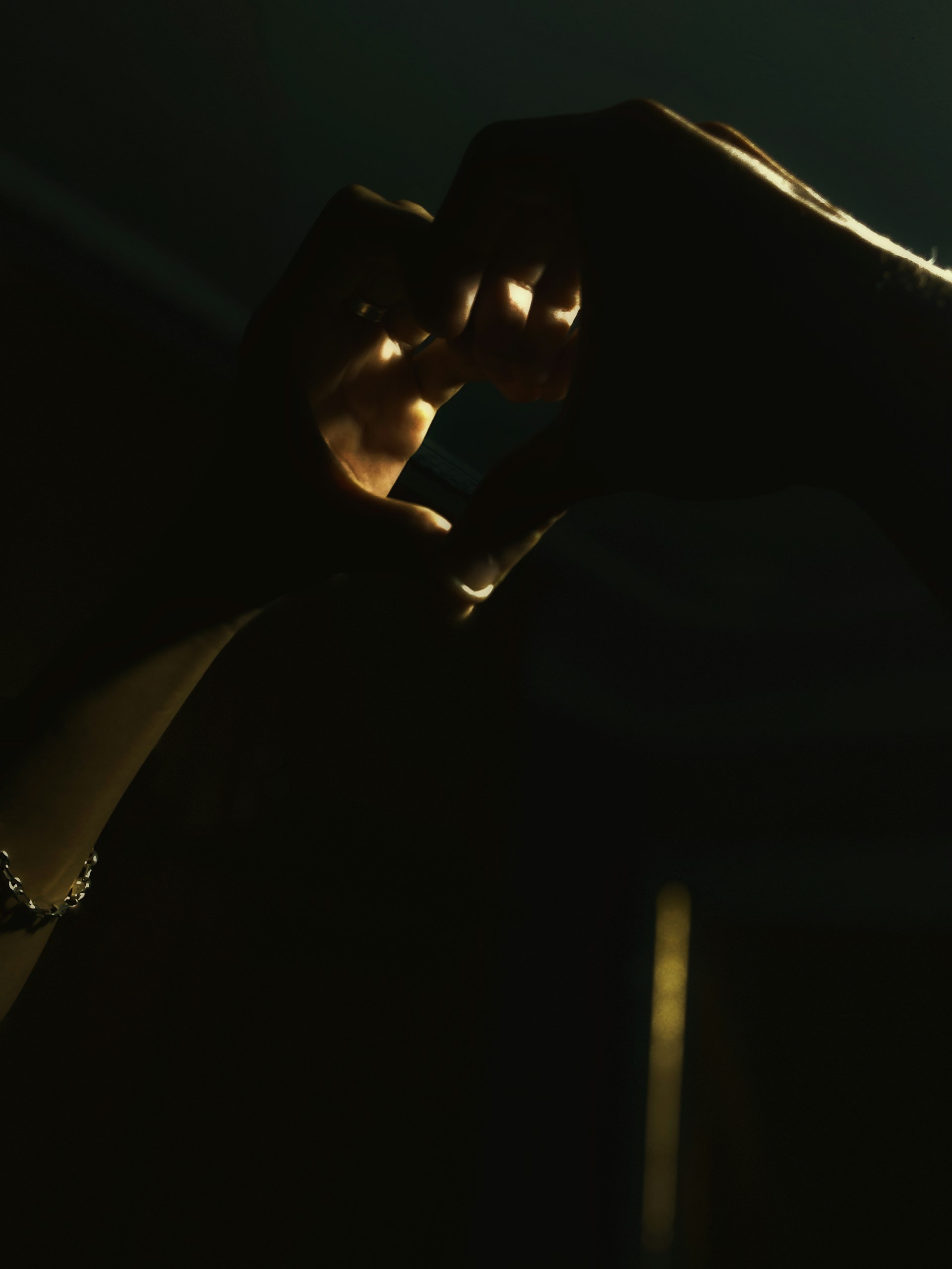 woman wearing yellow long-sleeved dress under white clouds and blue sky during daytime