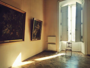 A serene private room bathed in soft natural light, offering a peaceful retreat for rest and reflection.