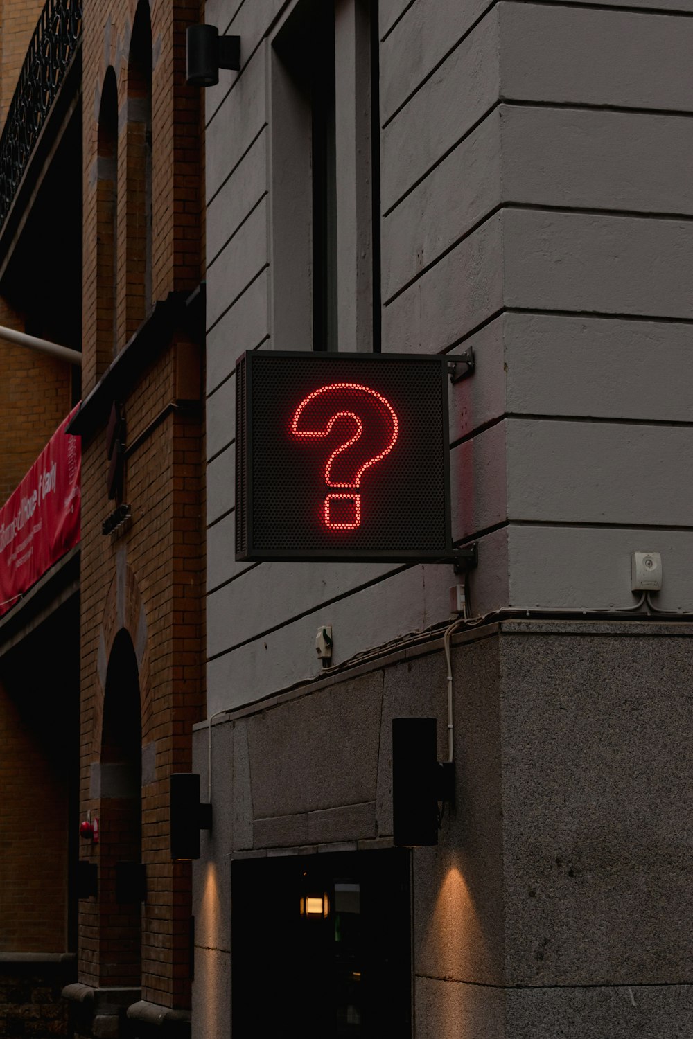 a neon sign on the side of a building