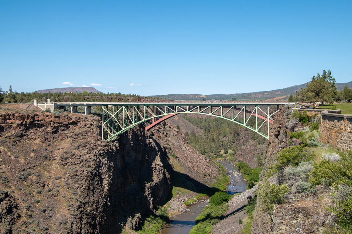 A bridge spanning a deep river canyon — the kind of view from the Peter Skene Ogden viewpoint