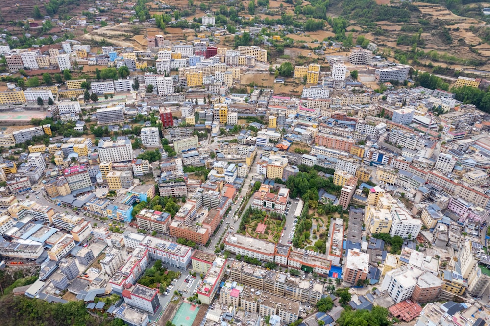 an aerial view of a city with lots of buildings
