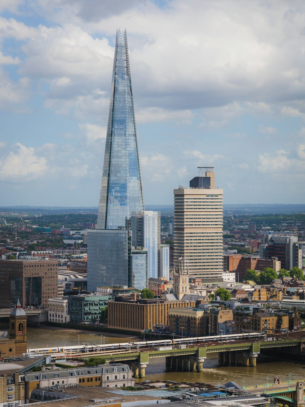 a view of a city with a very tall building