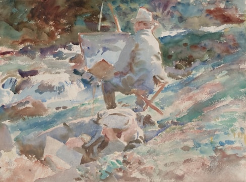 Two figures are engaged in plein air painting beside a flowing river. One artist is seated on a grassy bank with an easel set up, while the other lies prone, working on their canvas. The scene is captured in a watercolor style, with a soft blending of colors.