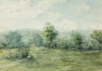 A serene landscape painting depicting a lush, green field with a few tall trees scattered across the horizon. The sky is a soft mix of pale blue and white, with fluffy clouds. The scene appears misty, suggesting early morning or after a rain.