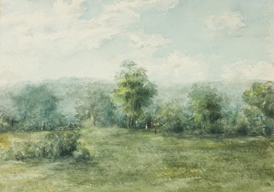 A serene landscape painting depicting a lush, green field with a few tall trees scattered across the horizon. The sky is a soft mix of pale blue and white, with fluffy clouds. The scene appears misty, suggesting early morning or after a rain.