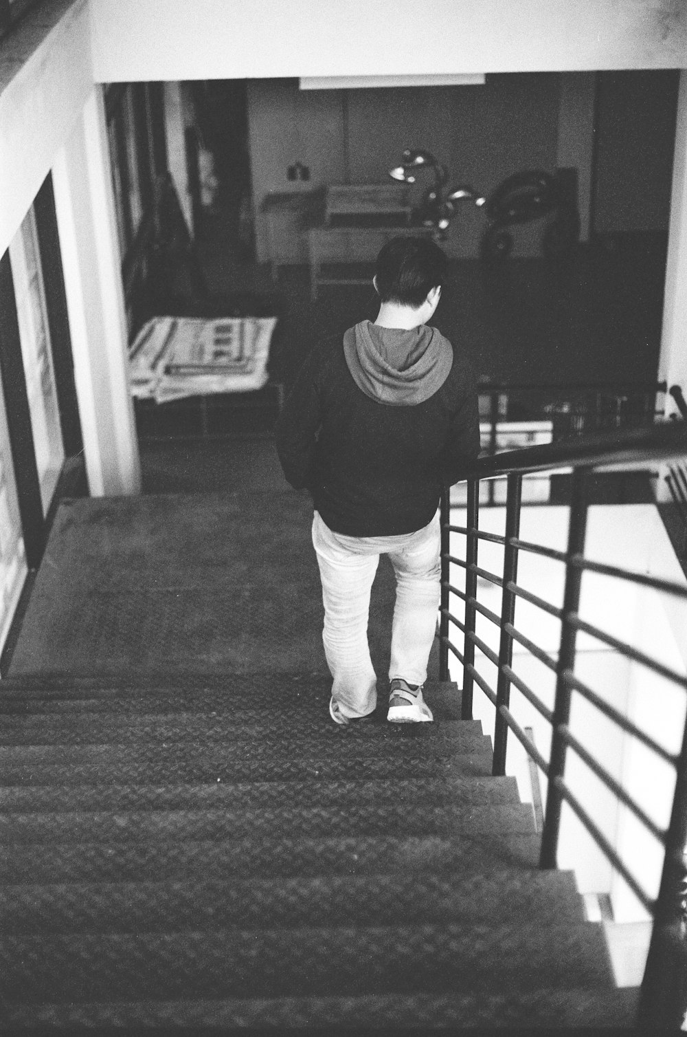 a man walking down a flight of stairs