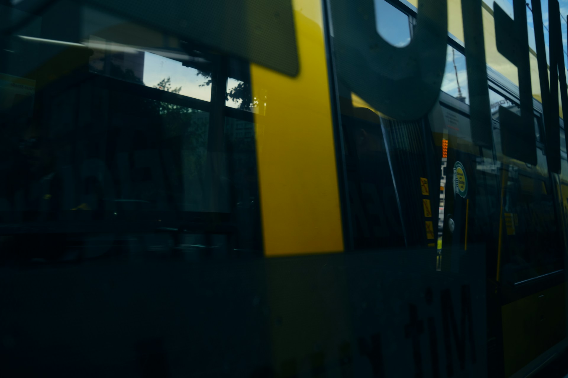 woman wearing yellow long-sleeved dress under white clouds and blue sky during daytime