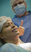 A satisfied customer receiving medical equipment from a friendly staff member.