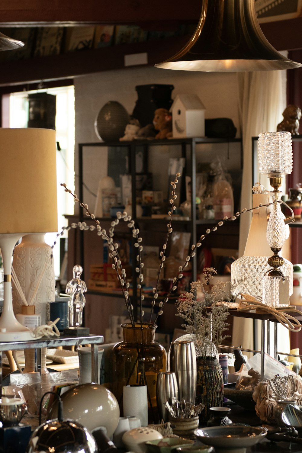 a room filled with lots of different types of vases