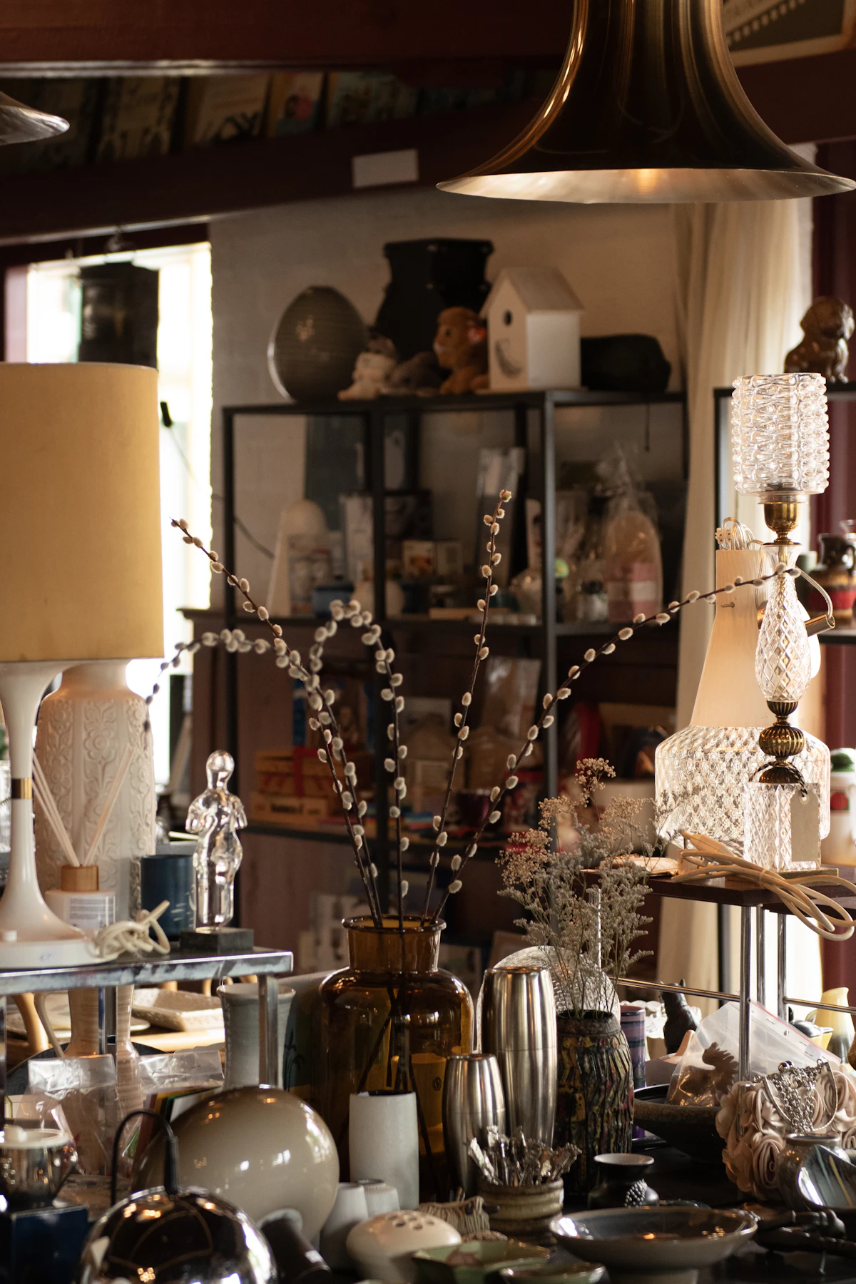 A room filled with antique vases and collectibles