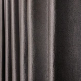 Close-up of premium fabric texture used in hospitality curtain designs.