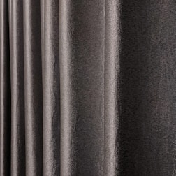 Close-up of high-quality curtain fabrics and textures offered by Perdevia.