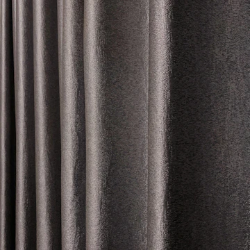Close-up of premium fabric texture used in hospitality curtain designs.