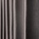 Vertical folds of a dark gray, textured fabric, resembling curtain pleats, evenly spaced.