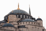 a very large building with many domes on top of it