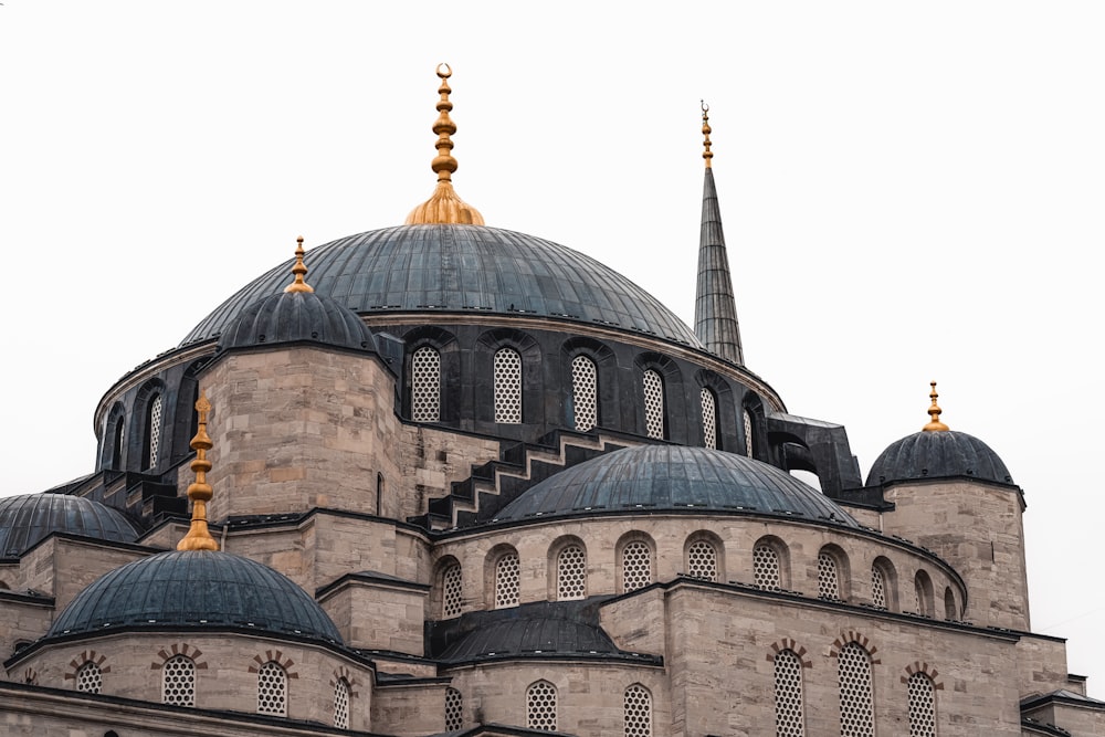 a very large building with many domes on top of it