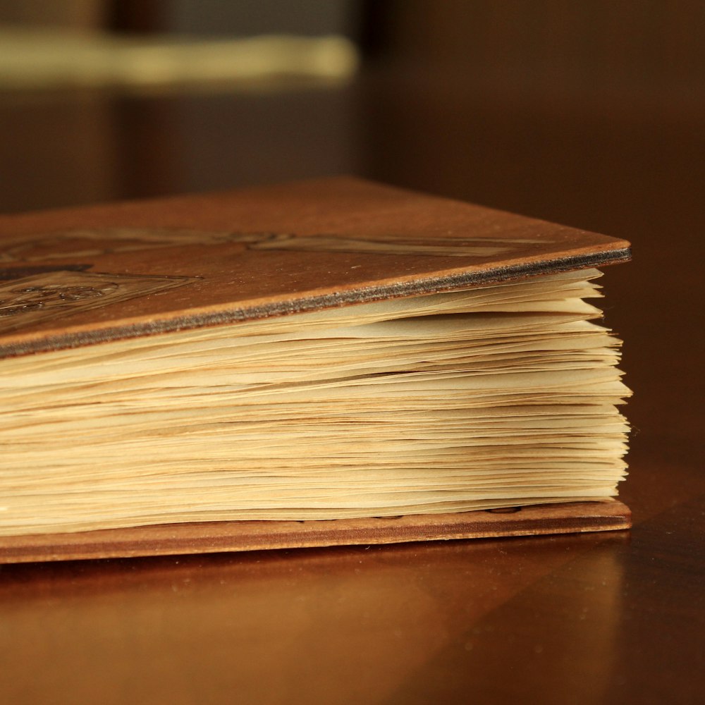 a close up of a book on a table