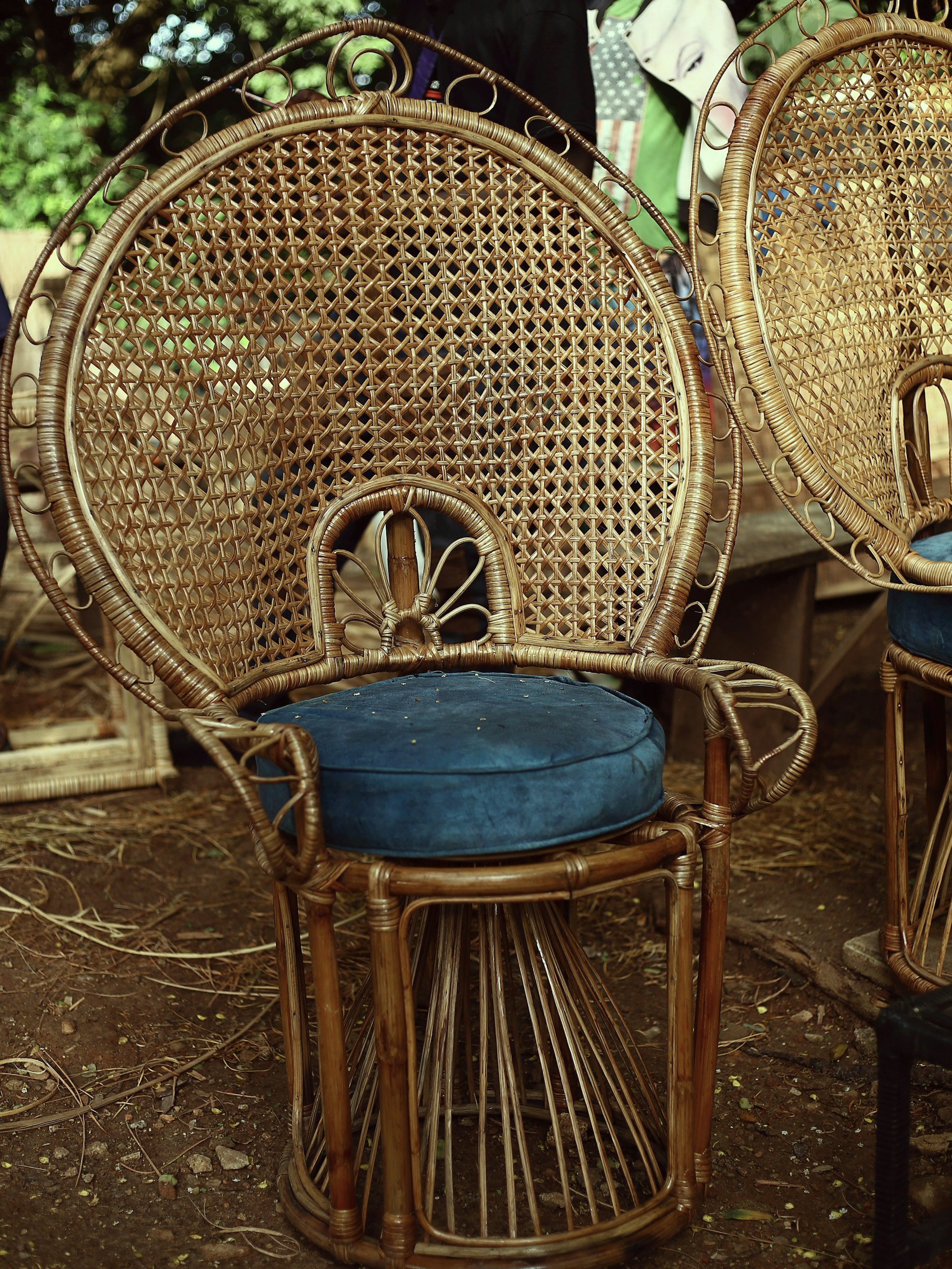 a couple of wicker chairs sitting next to each other