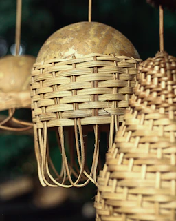 a bunch of baskets hanging from a ceiling