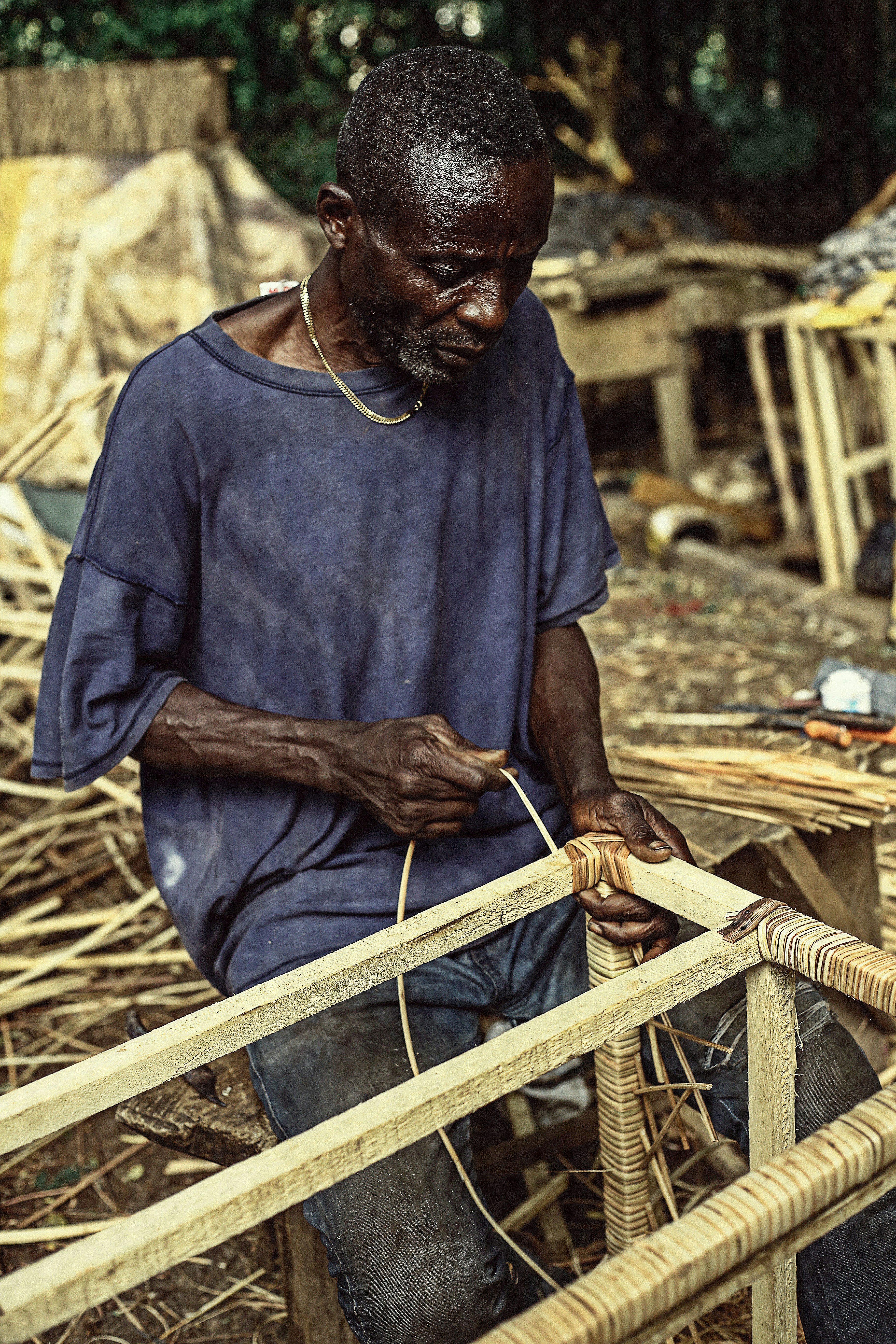 a man working on a piece of wood