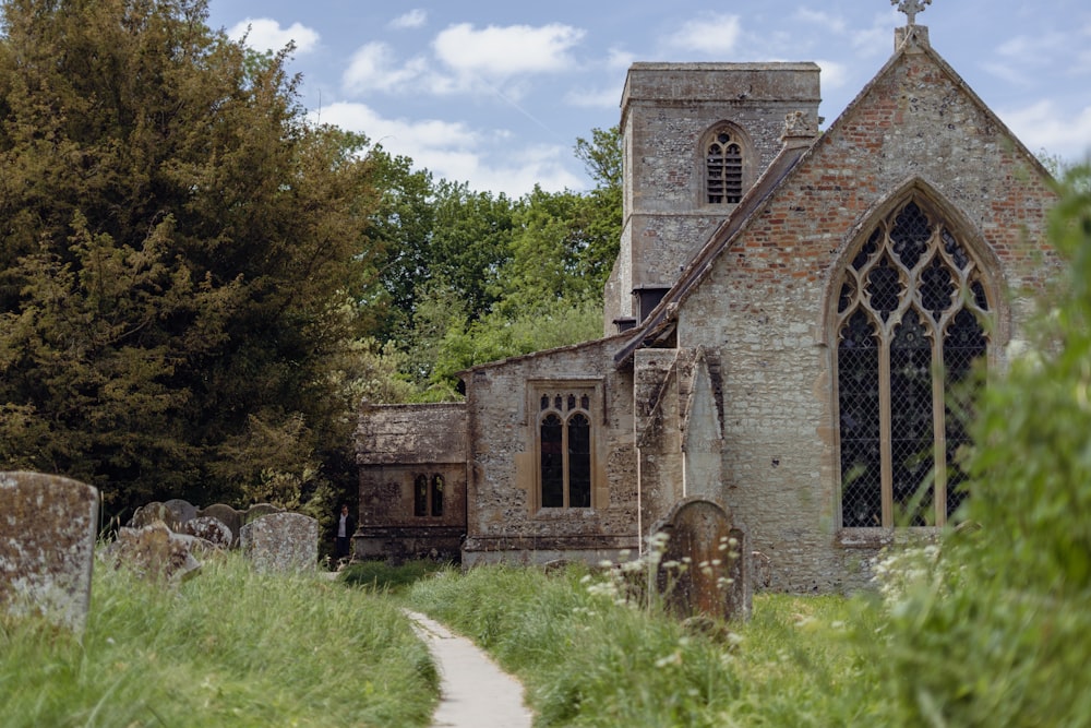 an old church in the middle of a forest