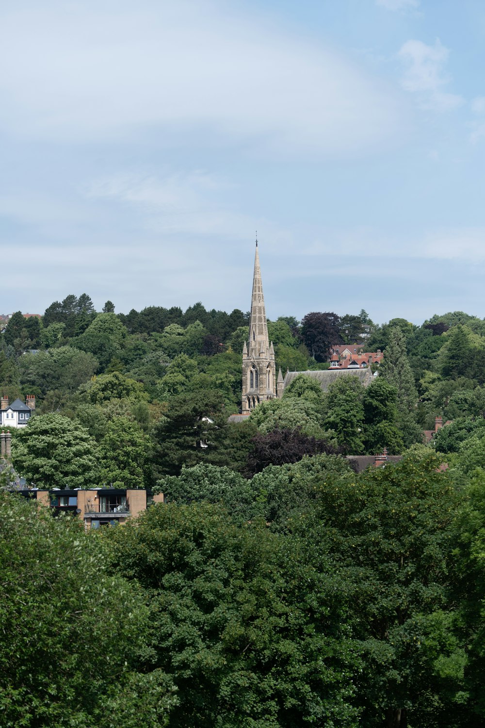 a view of a church tower from a distance