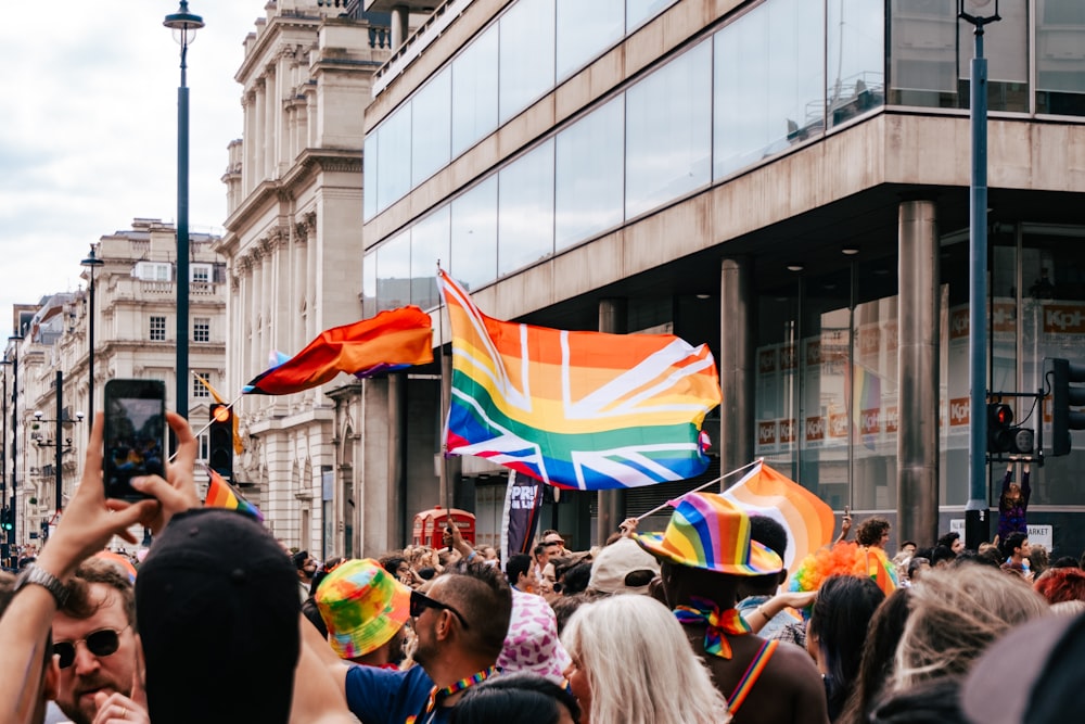 a crowd of people standing around each other