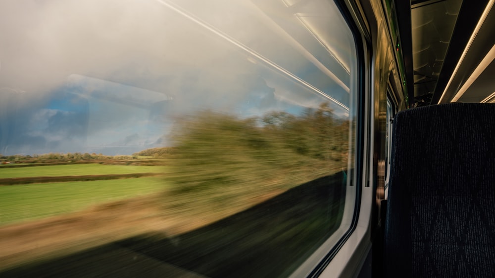 a blurry photo of a train going by