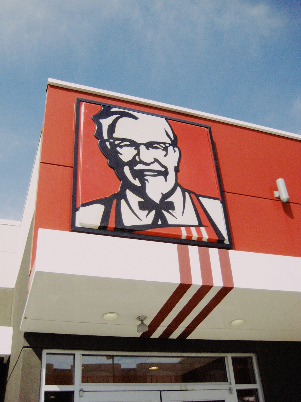 a picture of a man on the side of a building