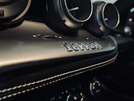 A customer’s car interior mid-clean, showing attention to detail on the dashboard.