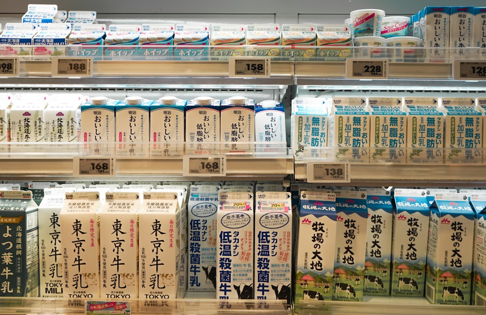 a display of milk in a grocery store