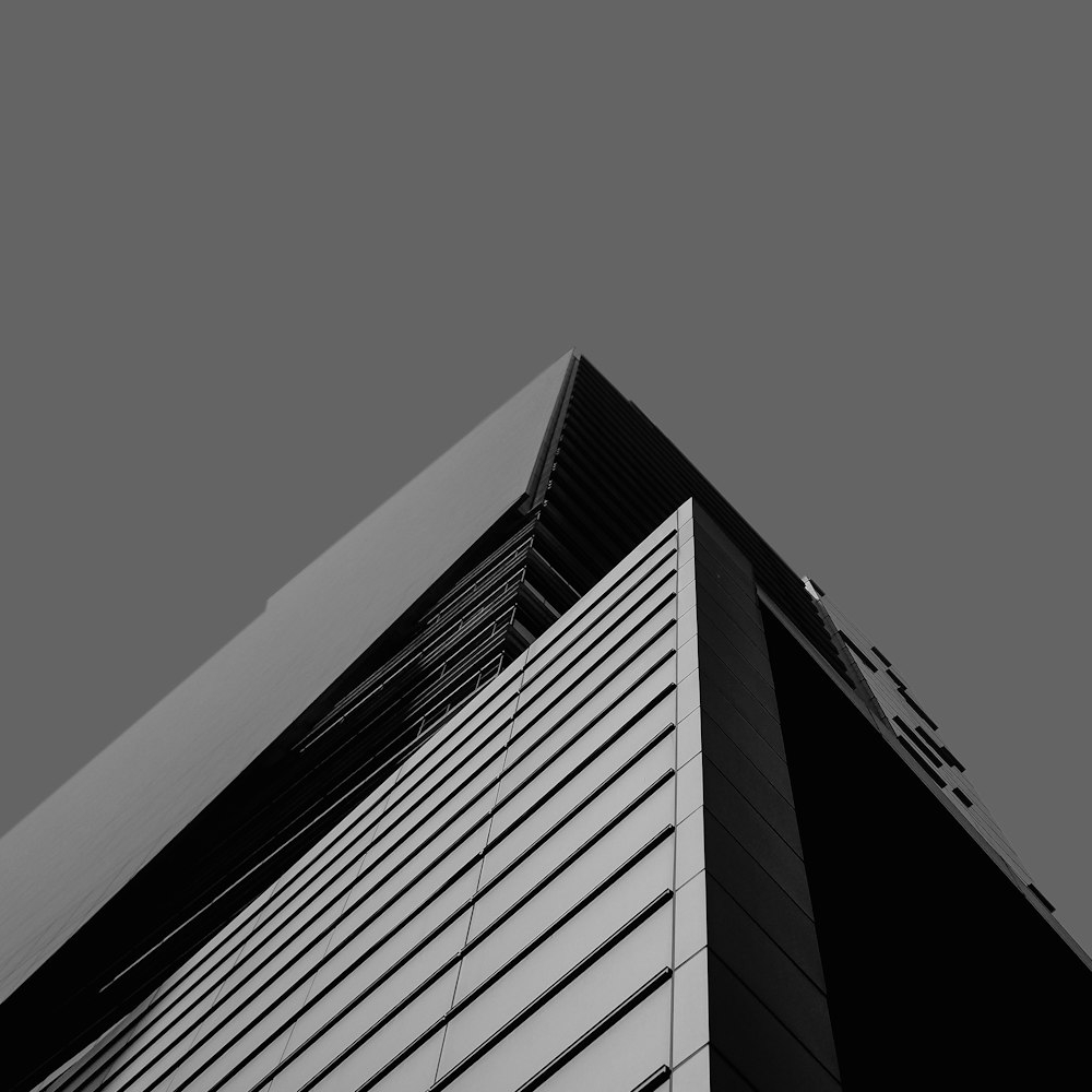 a black and white photo of a tall building