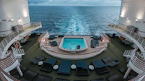 a pool on the deck of a cruise ship