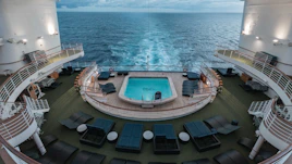 a pool on the deck of a cruise ship