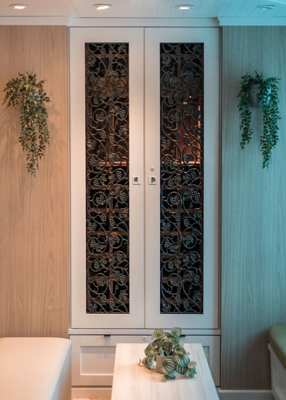 a room with a bench and a cabinet